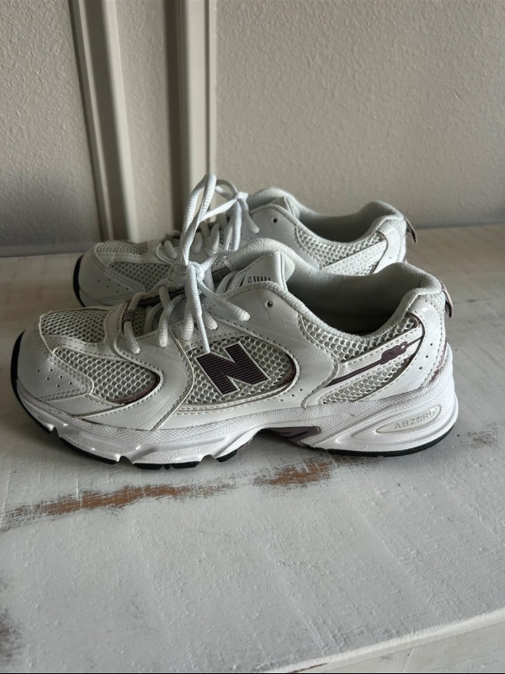 New Balance White Sneakers with Maroon Logo